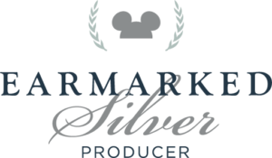WDW_Earmarked_Silver-Producer_Color-300x175 Earmarked Logo